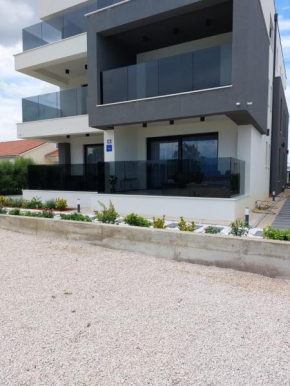 Luxury beachfront Villa Crystal Aenona - by TA Leut Agency